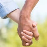 Couple holding hands