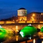 Dublin Four Courts And Bridge By Night