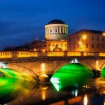 Dublin Four Courts And Bridge By Night