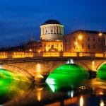 Dublin Four Courts And Bridge By Night