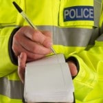 Policeman taking details