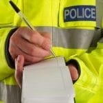 Policeman taking details