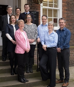 The Postlethwaite Solicitors team, with Robert Postlethwaite on the right