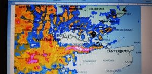 Image courtesy of @canveyisweather. Pink and white areas show more intense rainfall converging in a thin line over North Kent