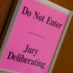 jury deliberating sign