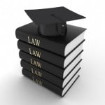 law books with graduation hat