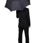 Businessman Holding An Umbrella