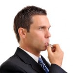 Businessman blowing whistle